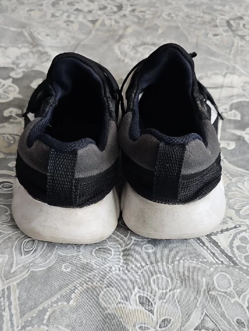 Nike Black Athletic Shoes with White Swoosh